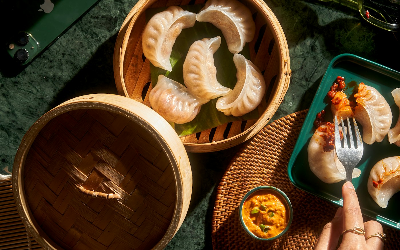 Translucent dumplings in bamboo steamers
