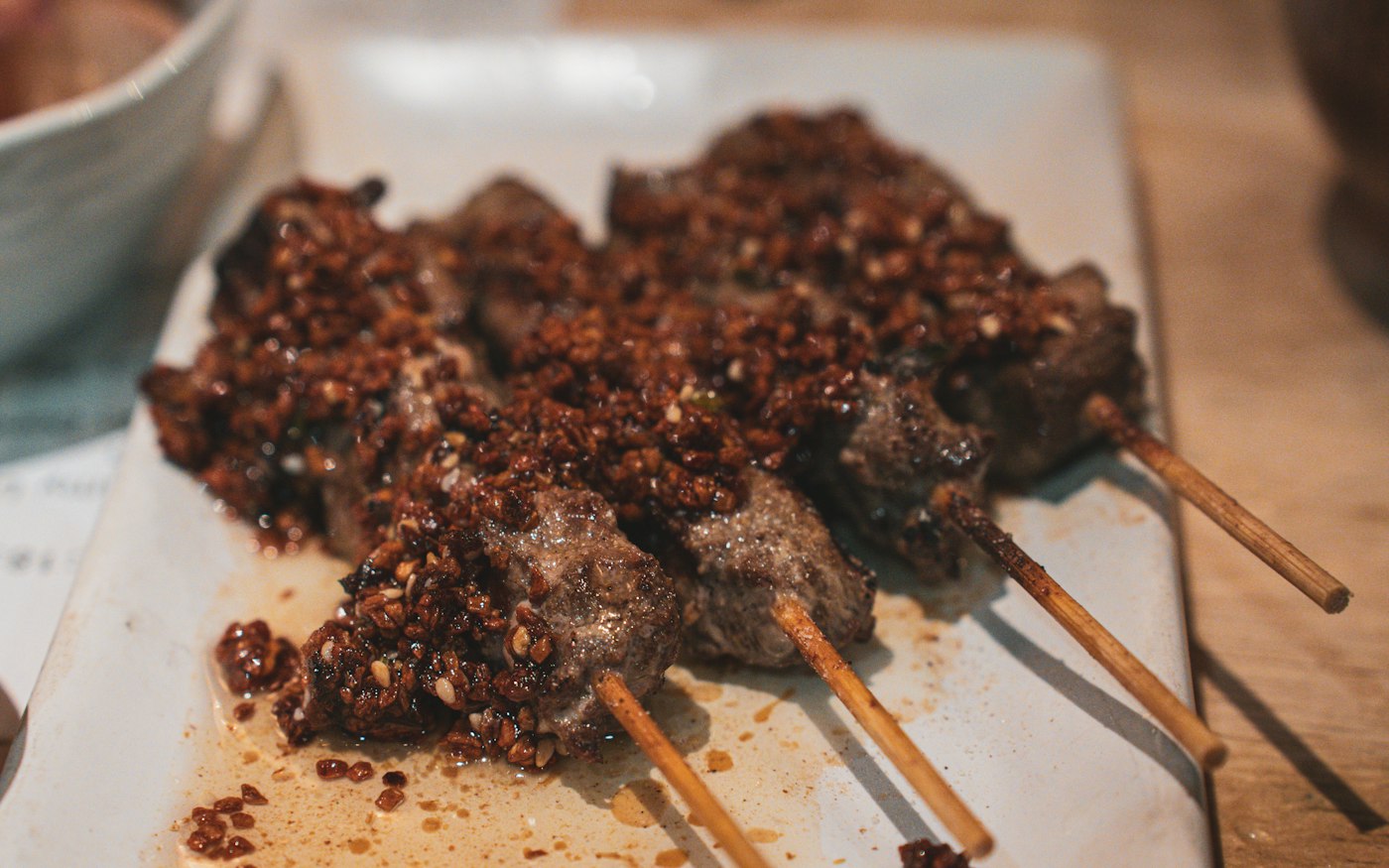 Lamb skewers crusted with cumin and chili